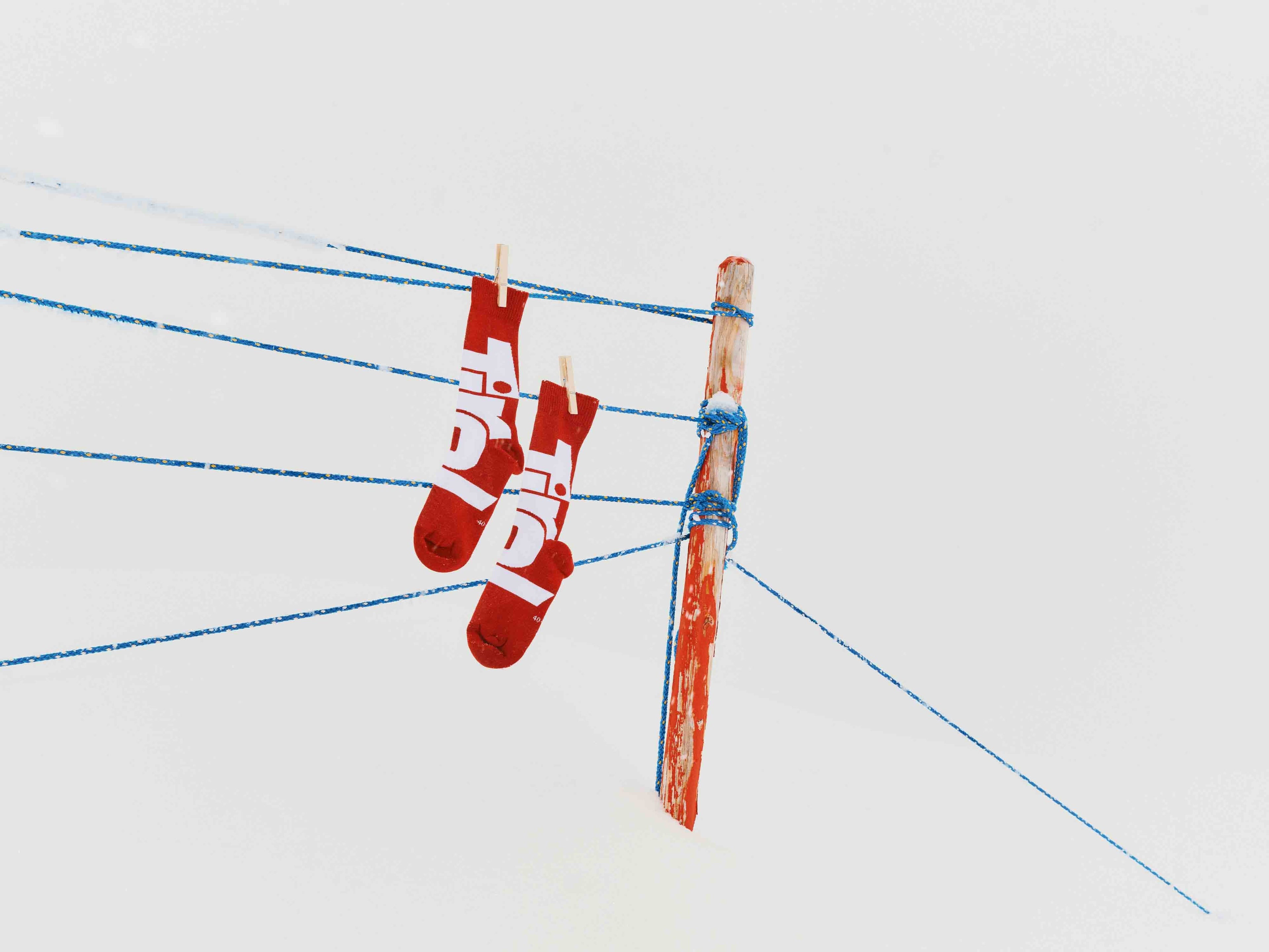 Socken "Tirol" in Rot mit weißem Tirol Logo