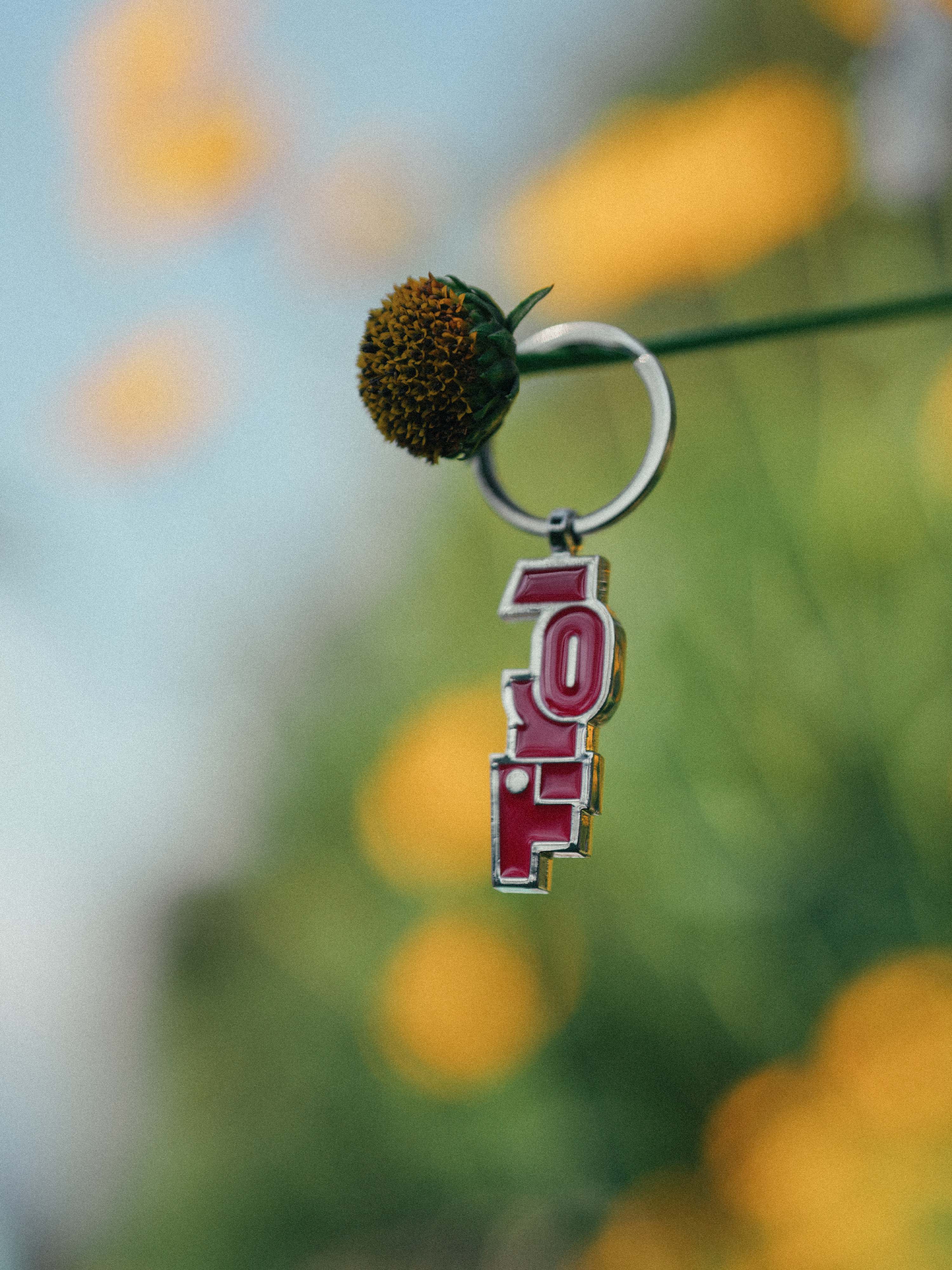 Schlüsselanhänger "Tirol" mit Soft-Emaille Logo in Rot