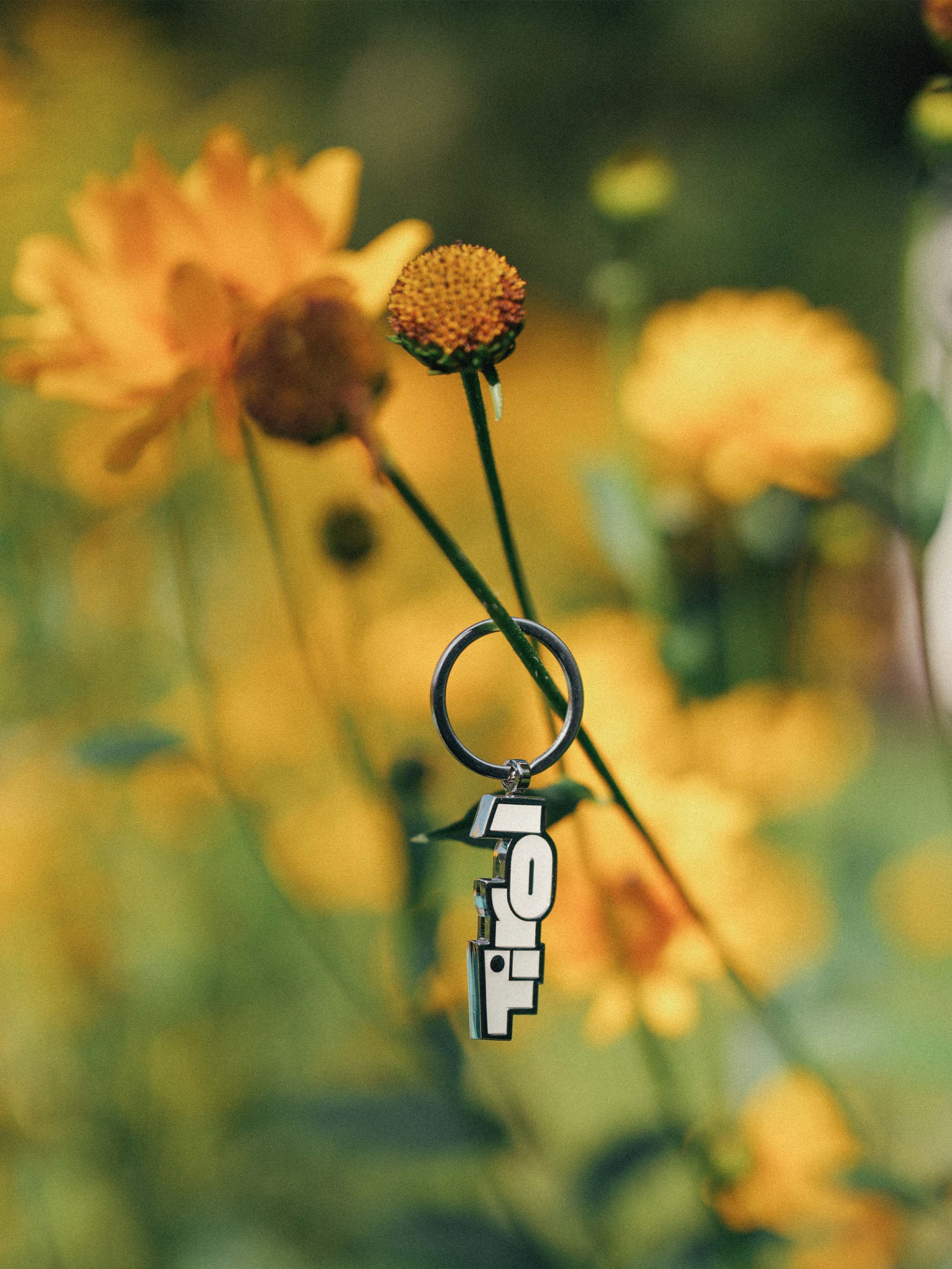 Schlüsselanhänger "Tirol" mit Soft-Emaille  Logo in Weiss