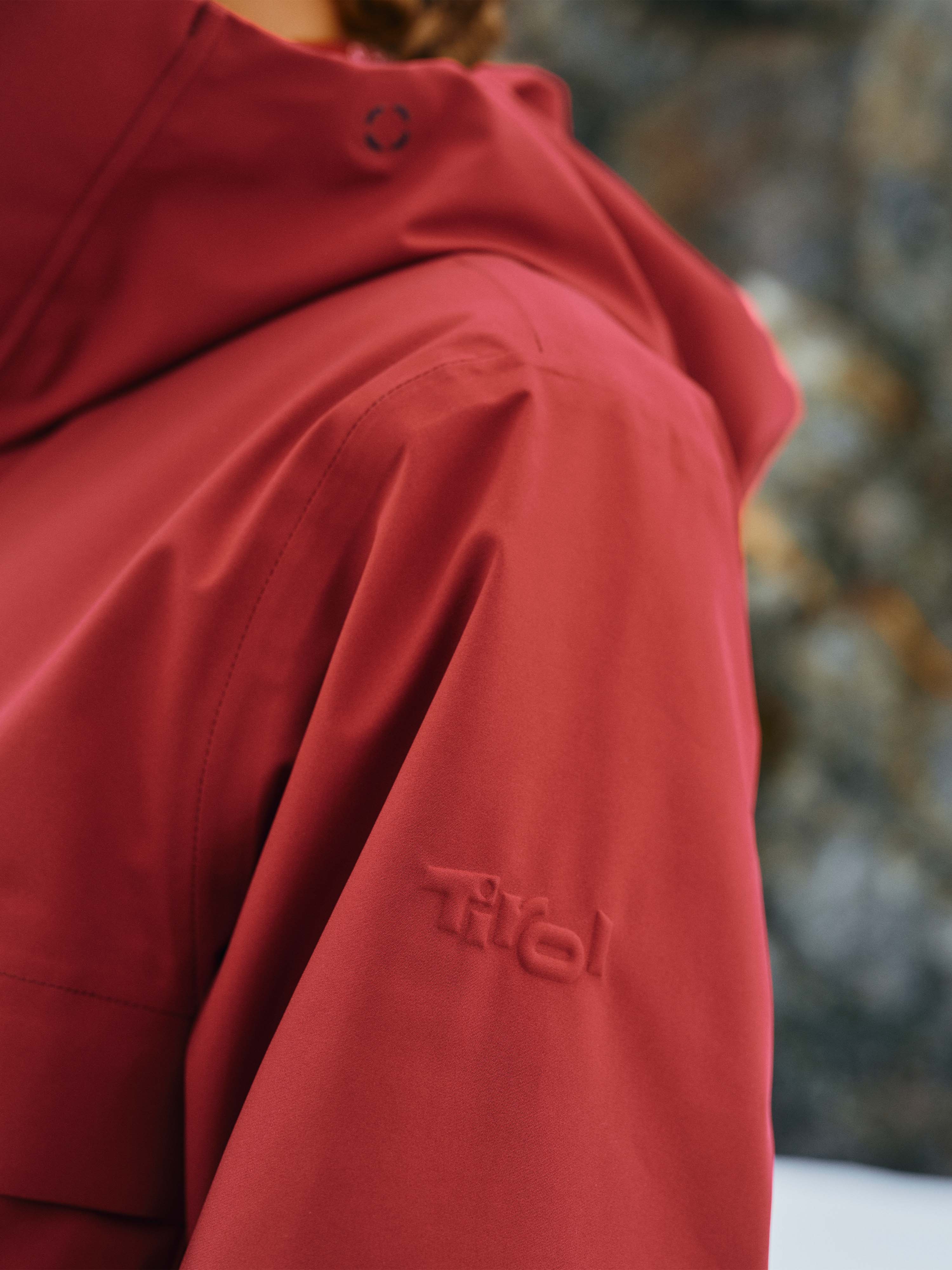 Unisex Winterjacke "Toni" in Rot mit geprägtem Tirol Logo